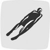 Mark displaying an athlete on luge sled