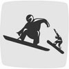 Mark displaying two athletes on snowboards competing in snowboard cross